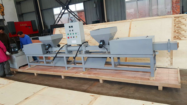 Two Heads Wood Sawdust Block Machine to Romania